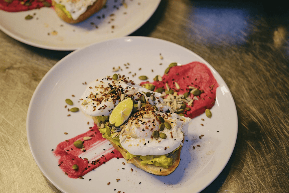 The vegetarian breakfast wrap with scrambled eggs, roasted vegetables, and herb mayo provides a satisfying meat-free alternative (Source: Lifted Coffee & Brunch)